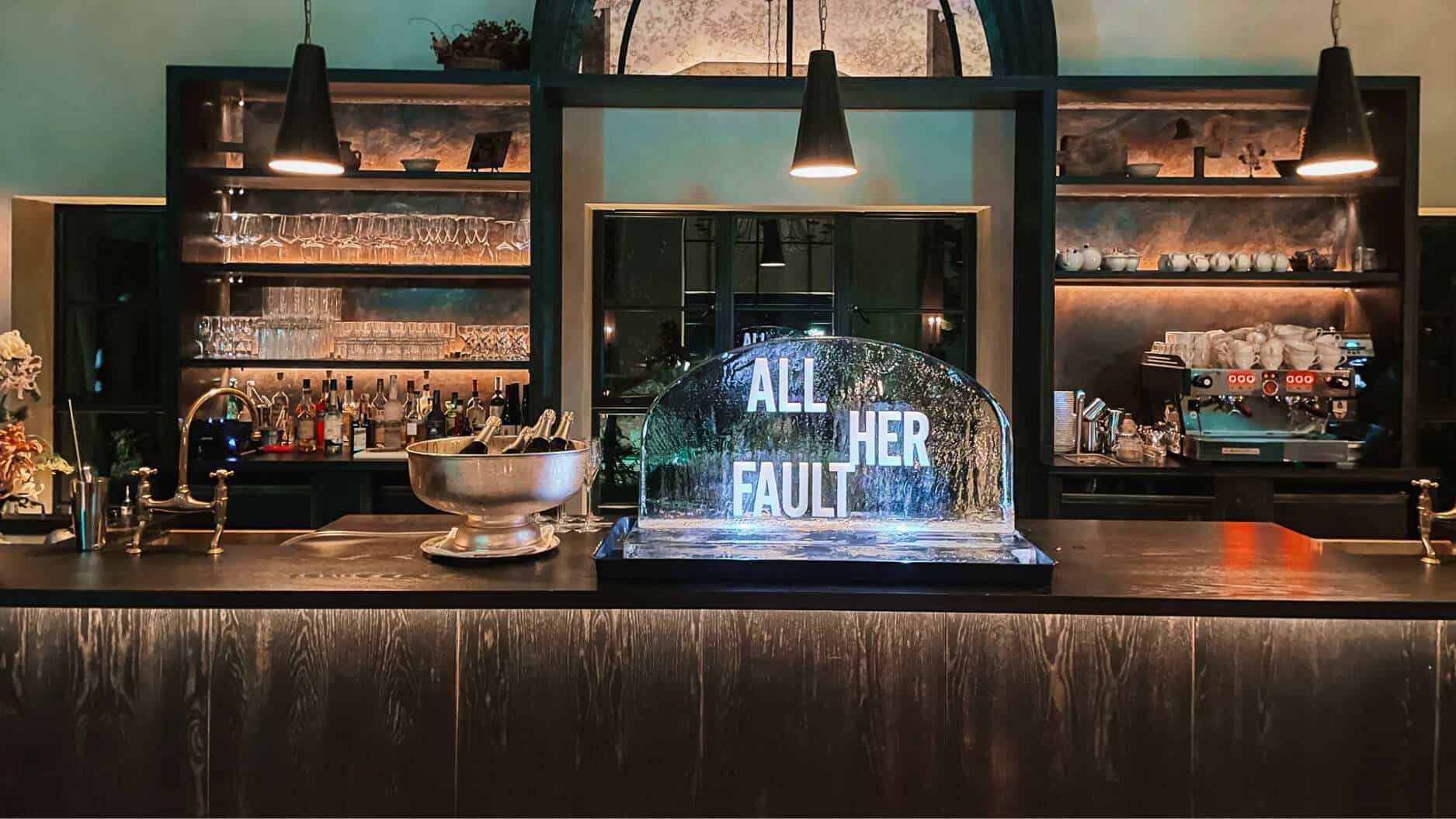 Bar with illuminated ice sculpture